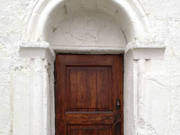 Bilde til punkt 8 Guds Lam over døra